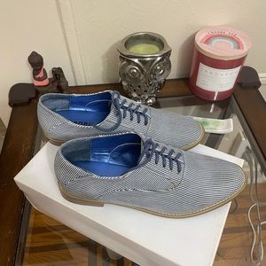 Blue and white stripe lace up shoes